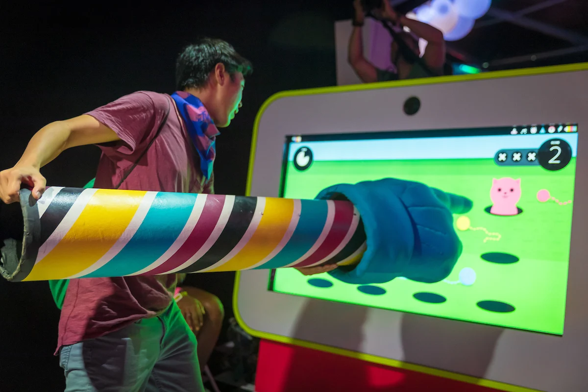 A visitor playing Giant Gestures